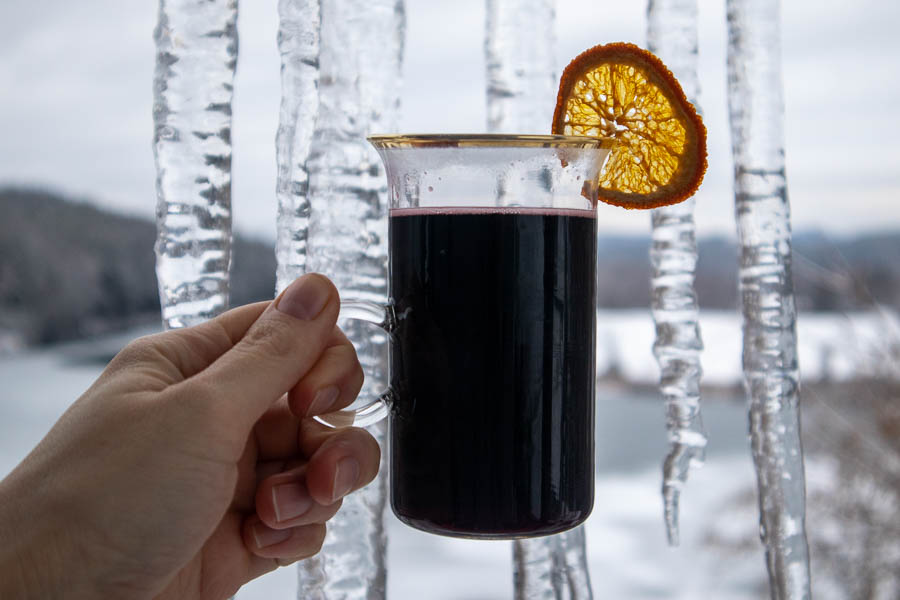 Spicebush mulled wine with orange garnish