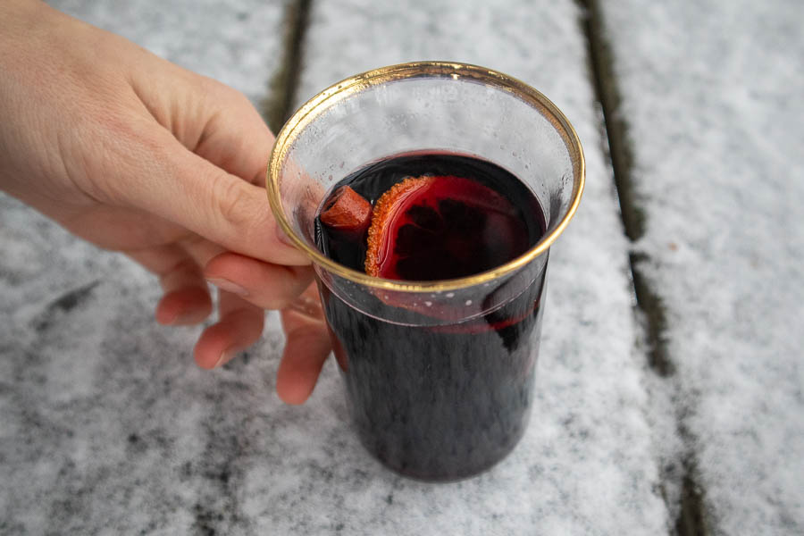 Spicebush mulled wine on snowy bench