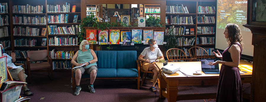 Carolyn teaching a class on edible garden weeds